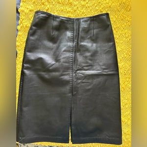 Leather midi skirt with front and back slits. Excellent condition. Size 2.